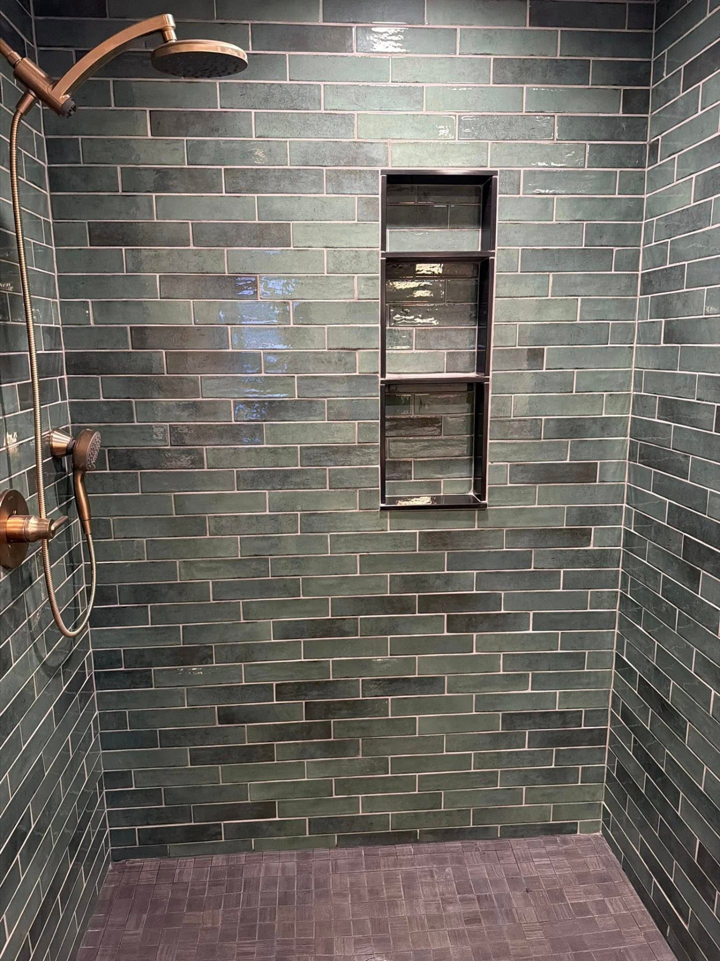 Hand-glazed green subway shower